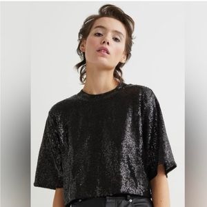 Black sequin short sleeved crop top. NWT, perfect condition!